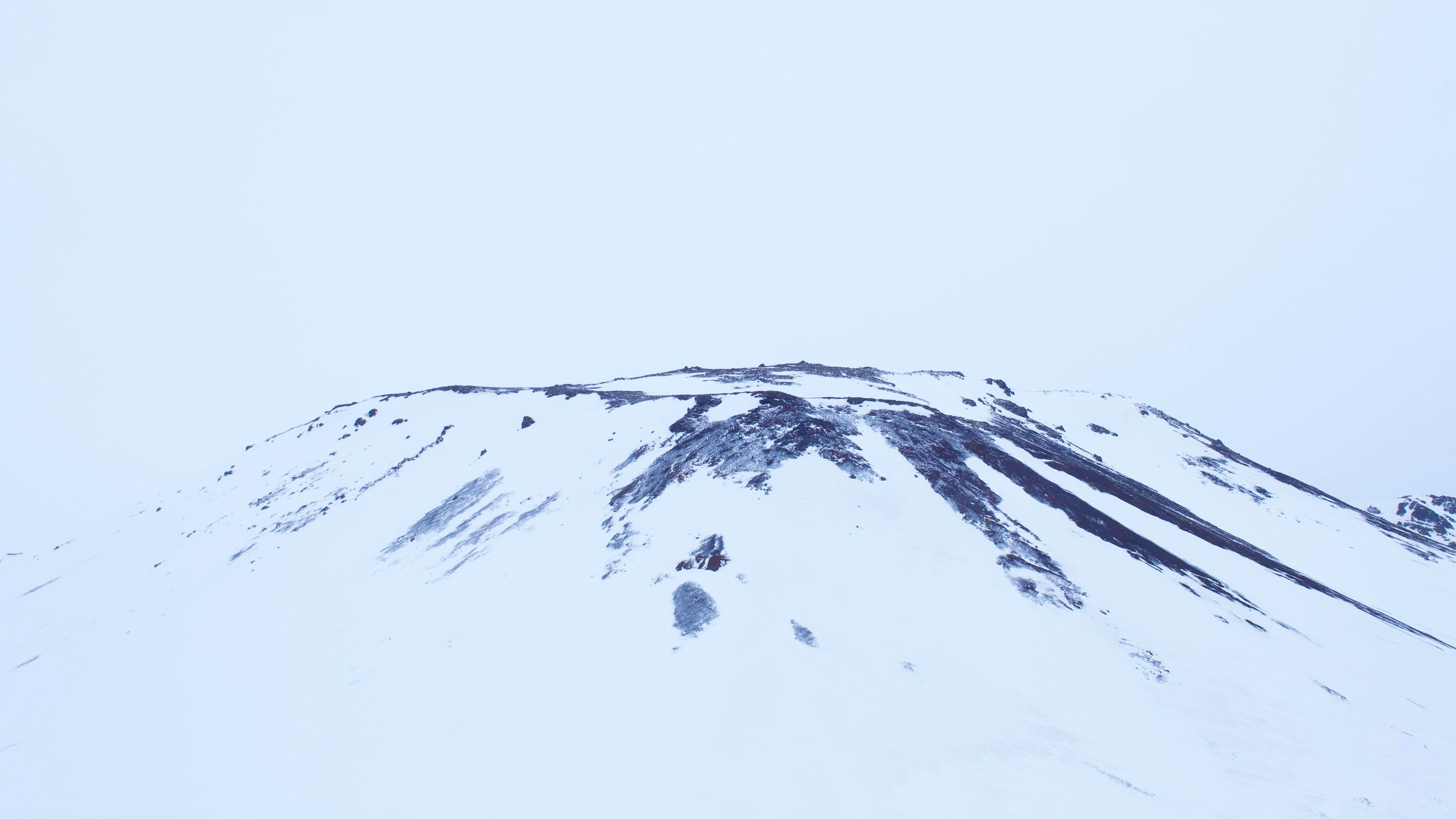 a_snow_covered_mountain_top.jpg