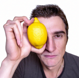 Model1_a_photorealistic_image_of_a_man_holding_a_lemon_near_his_face.png